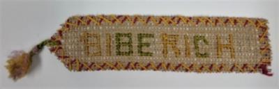 Bookmark with 'Biberich' written in cross-stitch
