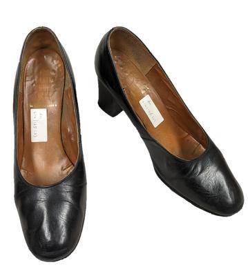 Pair of black court shoes