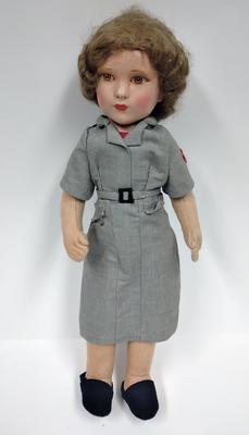 Doll dressed in the uniform of a Hospital Library Service worker; Toys and Games/doll; 1438/1