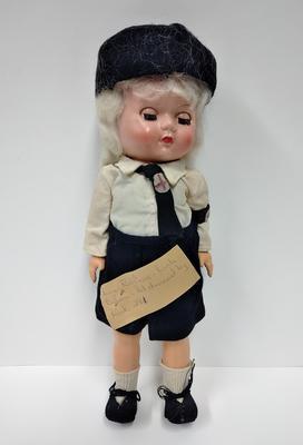 Doll dressed as a Junior Red Cross member
