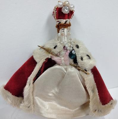 Small woollen doll dressed as Queen Mary