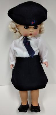 Doll wearing British Red Cross dress uniform