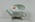 Feeding cup with Maltese type cross