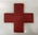 Presentation case in shape of red cross emblem