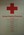 Poster with emblem: 'The Basic Principles of the Red Cross' listing each one and with explanation under each principle