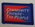 Red and blue cloth flash, to be worn on uniform by Red Cross Youth who holds a certificate in Community Friends-The People. With the words 'Community Friends - The People' in white.