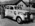 Black and white photograph. British Red Cross Commisoner's staff car with driver, Pakistan