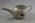 Porcelain ceramic feeding cup with Geneva Cross