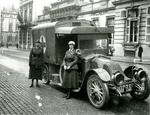 Two British female ambulance drivers with their vehicle