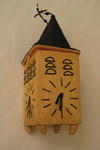 Box made from plaited string in the form of a clock tower