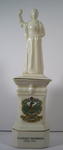 Porcelain figure of Florence Nightingale standing on a plinth