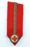 Gorget patch: red with gold line with embroidered emblem. Worn by County President.