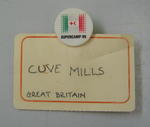 Paper and plastic name badge: Clive Mills Great Britain.