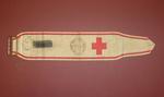 white armband with red trim and metal fastening