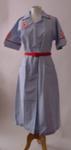 plain red belt worn with serf/vermillion and white striped dress
