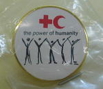 circular badge: 'the power of humanity'