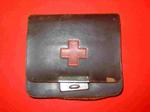 Brown leather purse with Red Cross emblem