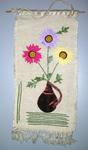 Woven wall hanging with applique motif of flowers on hessian: Fed Republic of Germany