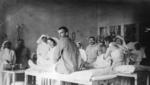 Members of the Berry Unit attend to dressings in a treatment room of the Anglo-Serbian Hospital, Serbia