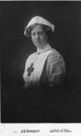 Studio portrait of Florence Egerton in Red Cross uniform with a Sister Dora cap