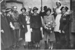 Mrs Dixon with group at a ceremony