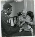 British Red Cross volunteer visiting a person at home