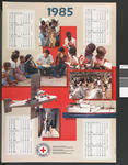 IRCR 1985 calendar/poster with seven different colour photographs depicting examples of Red Cross aid superimposed over a large Red Cross.