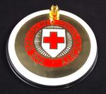 Plastic circular British Red Cross pen holder