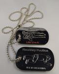 Metal dog tag produced as part of the Red Cross Life. Live it campaign