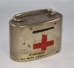 Small, oval, British Red Cross collecting tin with handle and locking mechanism