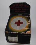 Red Cross collecting box with record player inside.
