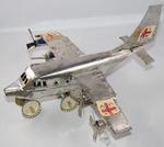 Model Red Cross aeroplane made from cooking oil tins by children in Angola