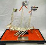 Silver model of a boat in a presentation box gifted by the Hong Kong Red Cross