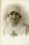 Laminated reproduction of a portrait photograph of nurse Florence Baker, 1919