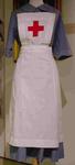 Replica Member's indoor uniform white apron with red cross on square bib and two gold safety pins