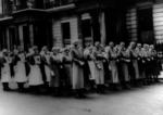 A group of personnel assembled outside British Red Cross headquarters in London