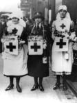 Dame Beryl Oliver with a commandant and a nursing member during a flag day