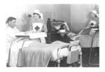 Nurses attending patients at a Hammersmith Hospital