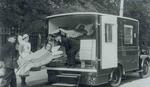 Loading patients onto a Home service ambulance