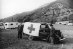 British Red Cross van distributing relief goods to caravan dwellers
