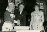 Marjorie Clay and Two other British Red Cross Officers cutting a Cake