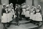 A Female Red Cross Officer wearing Outdoor Uniform Inspecting Lines of VADs ffrom the Farnham Division, Surrey, in Uniform