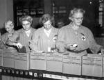 Women packaging American Red Cross prisoner of war Christmas package number 2