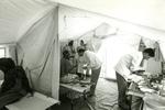Black and white photograph. A polyclinic in a tent for victims of the conflict in Yemen.