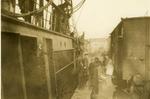 Black and white photograph of loading the British Red Cross mission stores at Salonica - Balkan War 1912-1913