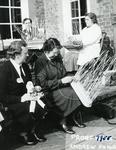 Black and white photograph of basket weaving activity at Barnett Hill
