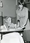 Black and white photograph used in Red Cross News of Felicity Ambrose and the Hospital Library service