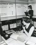 Black and white photograph from Red Cross News June 1976 of the Disasters Emergency Committee Operations Room set up to help victims of the Guatemalan earthquake