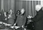 Black and white photograph of Angela Countess of Limerick receiving the Henry Dunant Medal at the Palais des Nations in Geneva