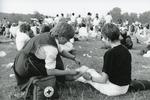 Black and white photograph of First Aid treatment at Knebworth Festival